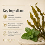 Key ingredients of a hair care product with sea kelp and peppermint leaves on a beige background.