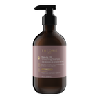 Theorie Marula Oil Smoothing Shampoo bottle on a white background